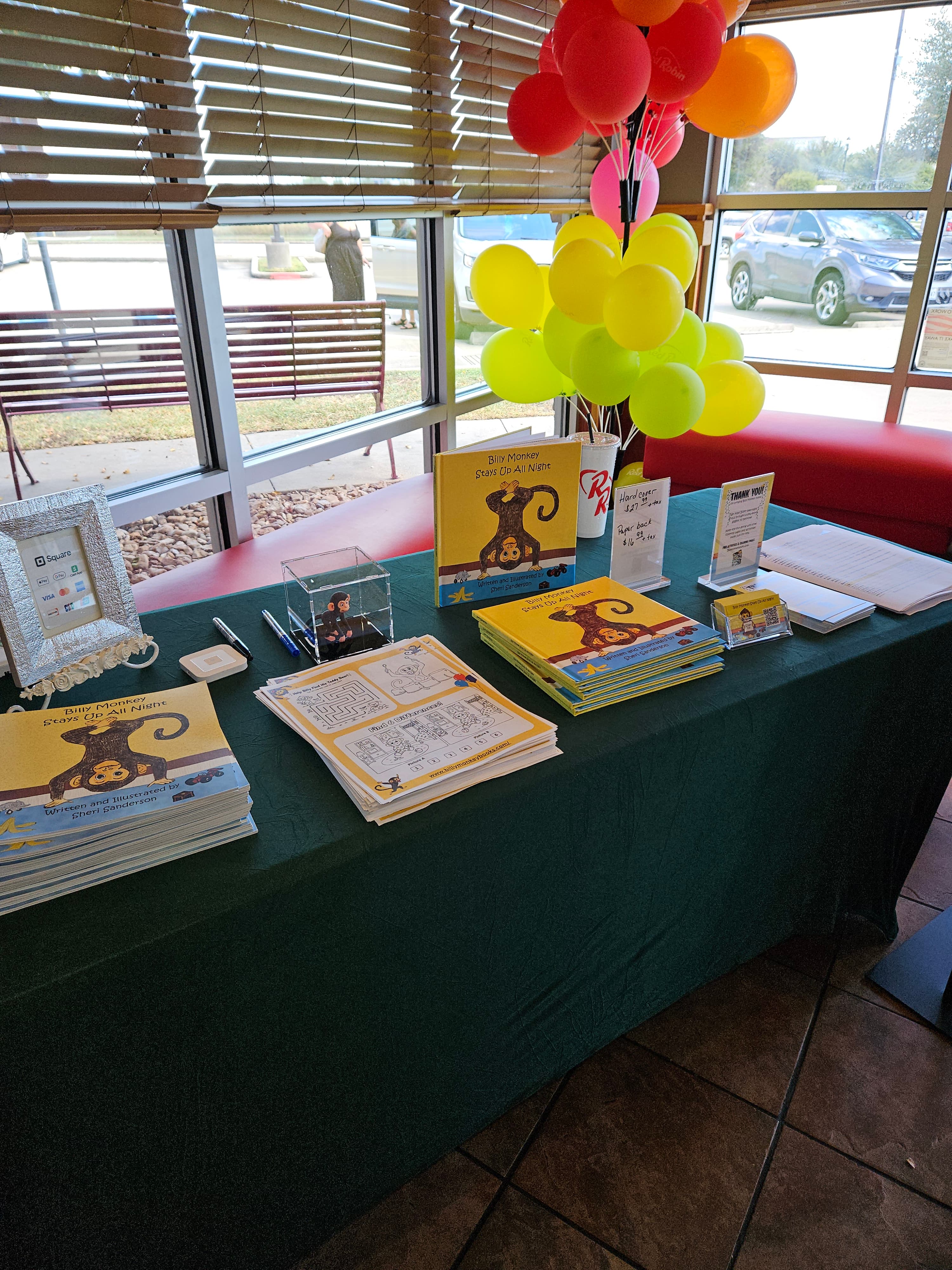 The Billy Monkey signing table with books and activity materials